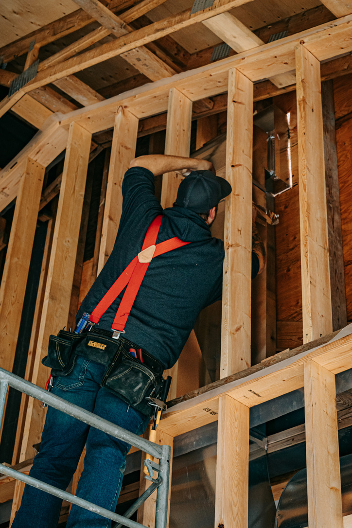 hvac worker in a roof
