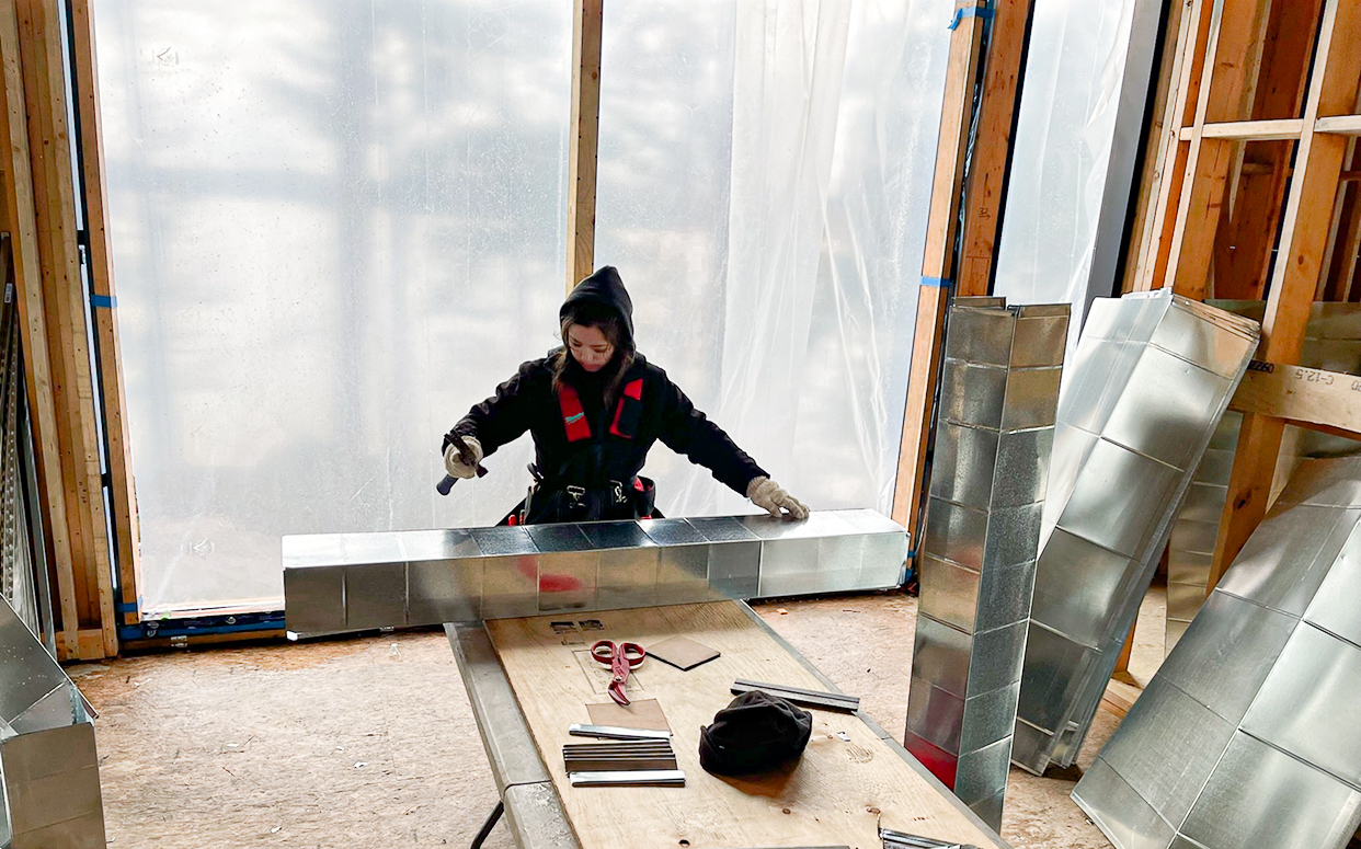 Hvac worker with duct